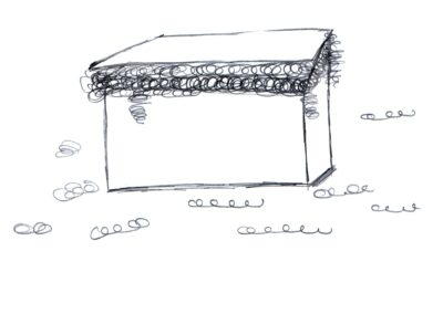 A large box overflowing with polystyrene peanuts.